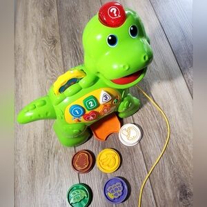 Bright Green Dino Learning Pull-Along Toy with Numbers & Shapes Age 12-36 Months